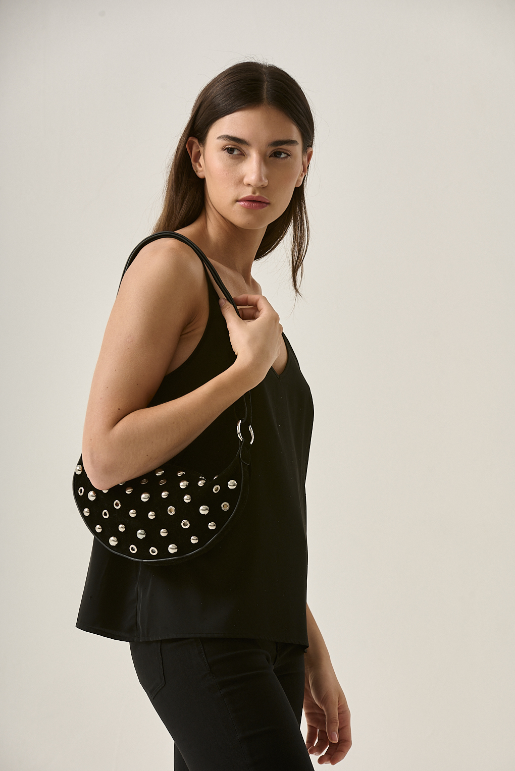 Cartera bandonlera tacha