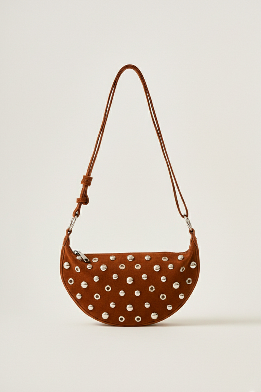 Cartera bandonlera tacha