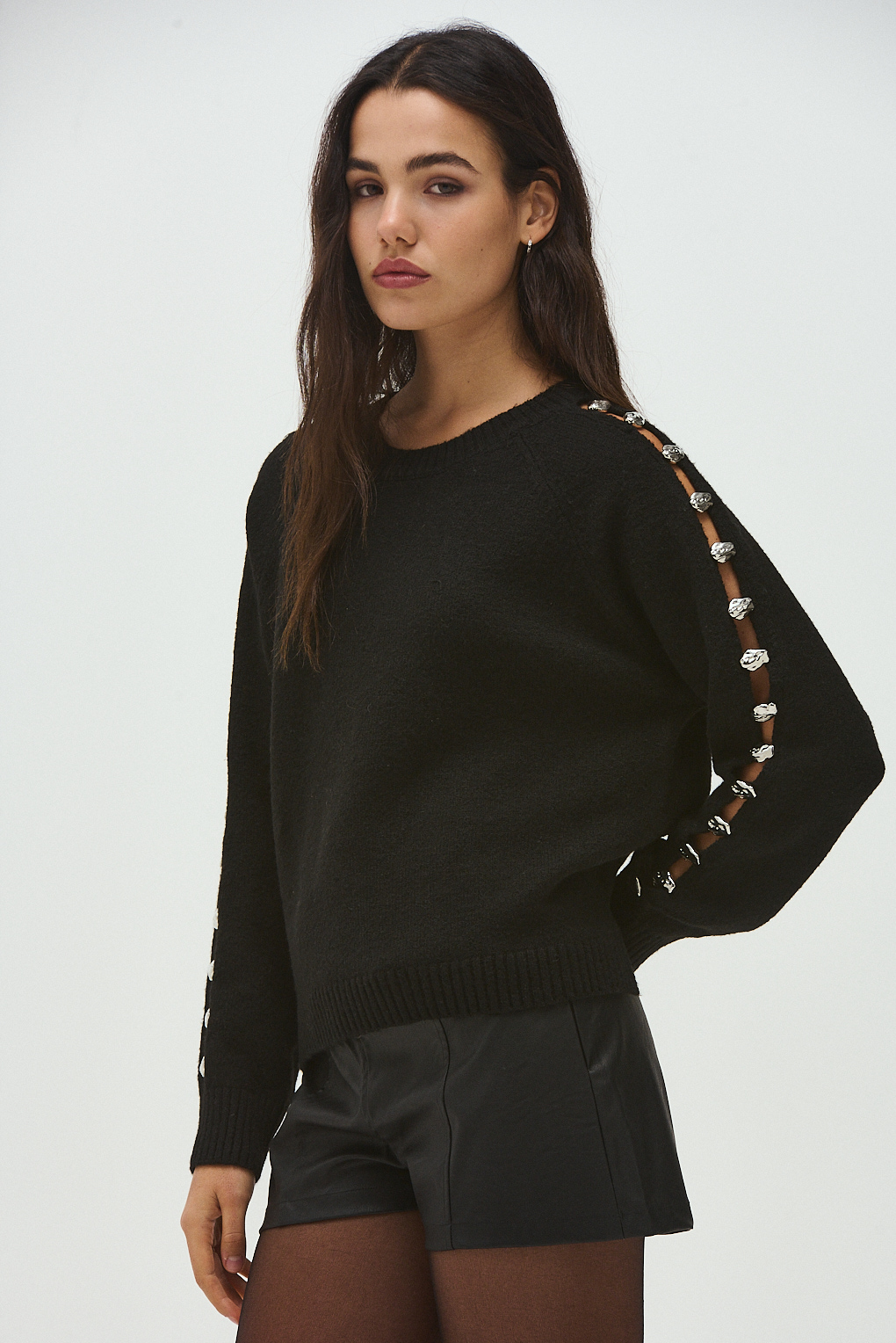 sweater tejido aberturas en las mangas