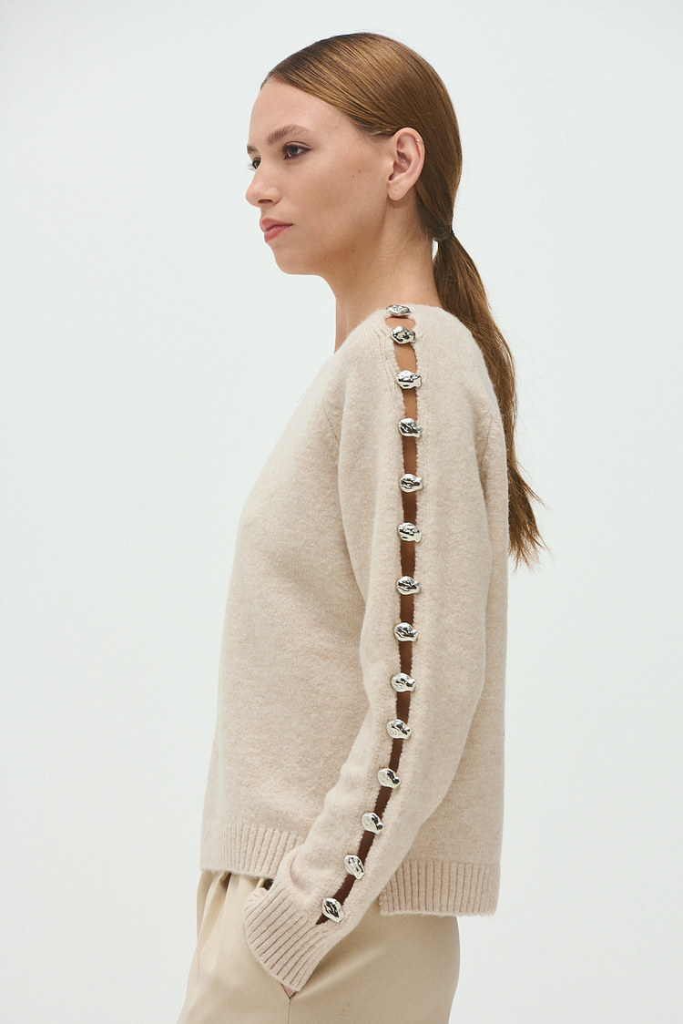 sweater tejido aberturas en las mangas